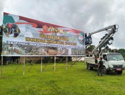 Satgas,TMMD ke 123,Kodim 0416/Bute”Memasang Baleho Raksasa Upacara  Penutupan”